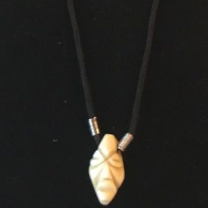 Ivory color bone mask necklace